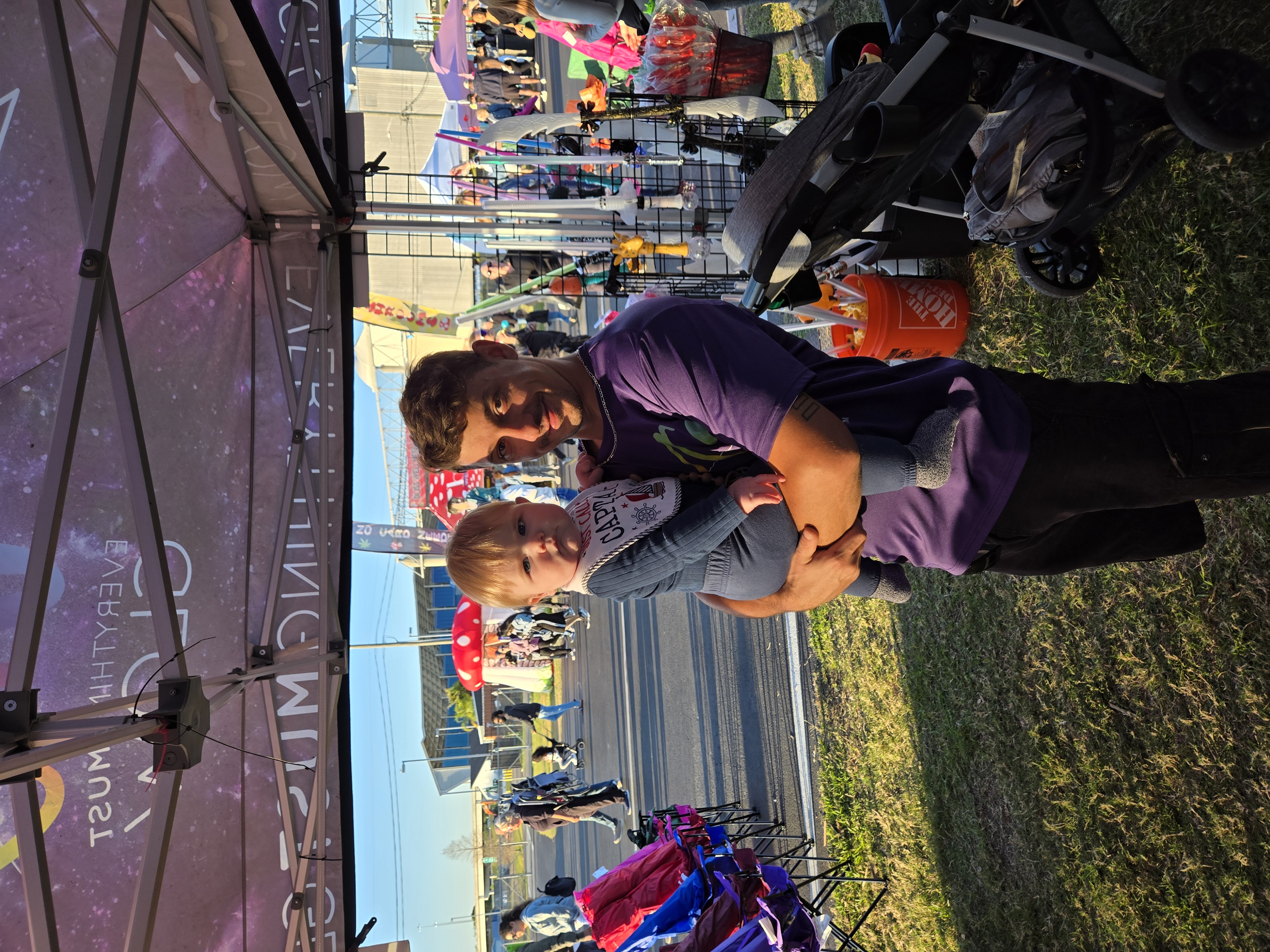 Family first — Bobby with his son in front of the EMG tent at an event