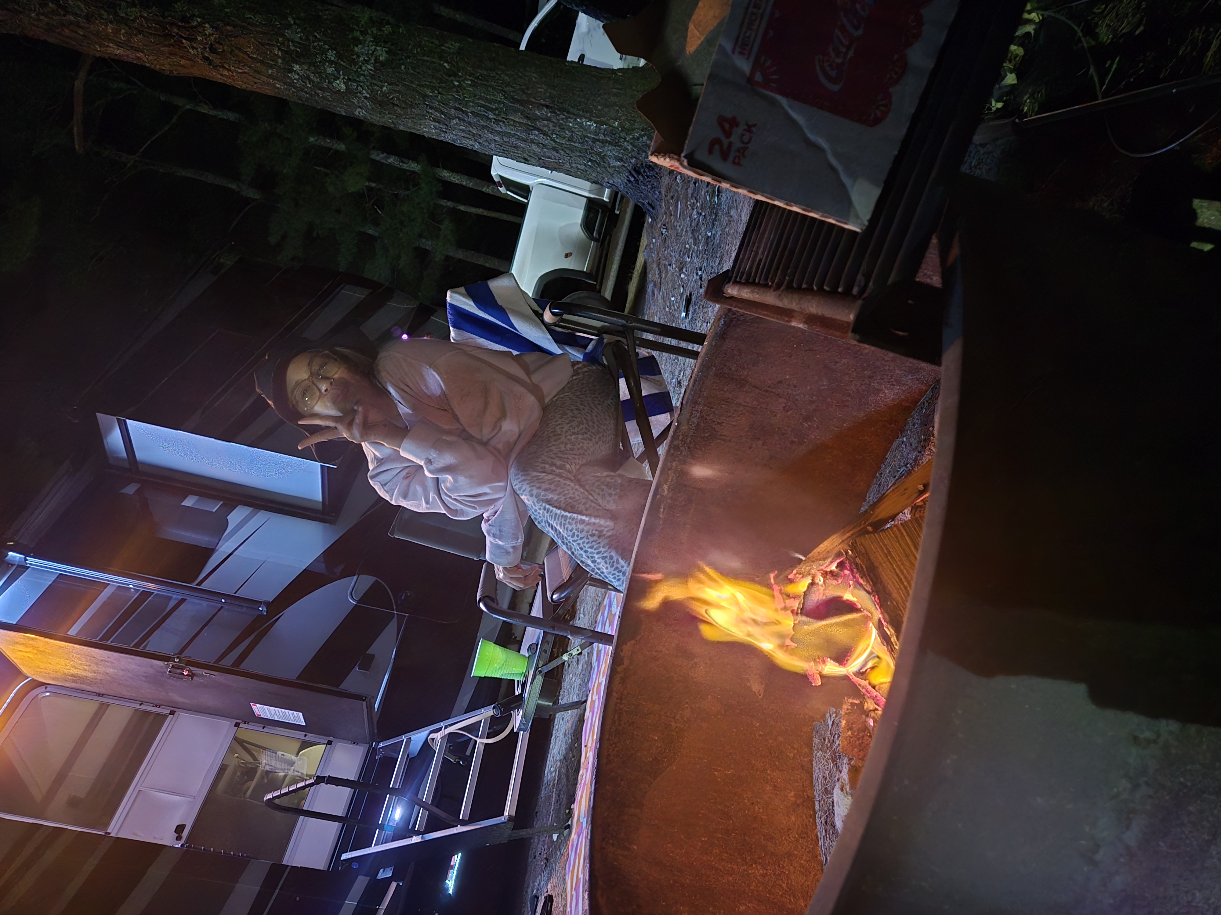 Relaxing by the campfire after a long event day — this is what freedom looks like